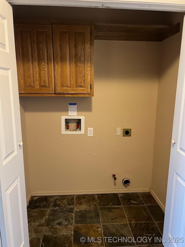 washroom featuring hookup for a gas dryer, hookup for a washing machine, cabinets, and electric dryer hookup