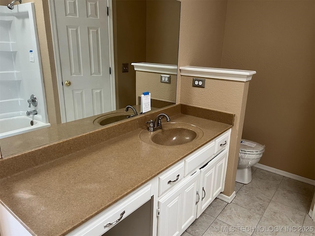 full bathroom featuring vanity, bathing tub / shower combination, tile patterned floors, and toilet