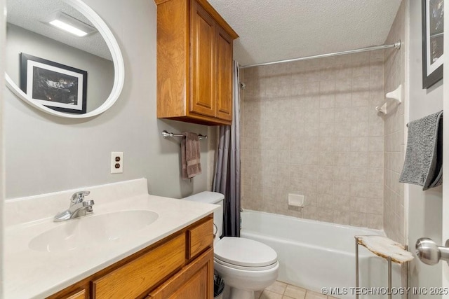 full bathroom featuring shower / tub combo with curtain, vanity, a textured ceiling, tile patterned floors, and toilet