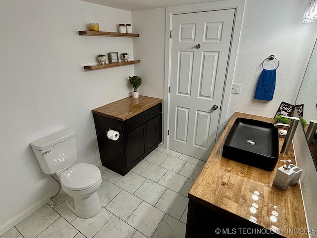 bathroom featuring toilet