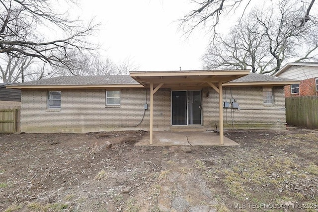 rear view of property featuring a patio