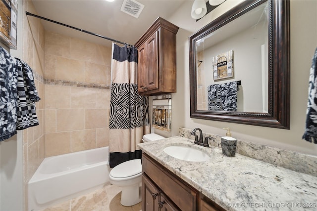 full bathroom featuring vanity, shower / tub combo, and toilet