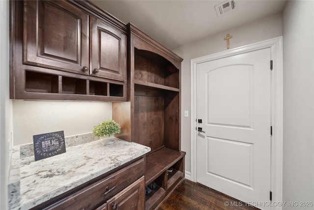 mudroom with dark hardwood / wood-style flooring