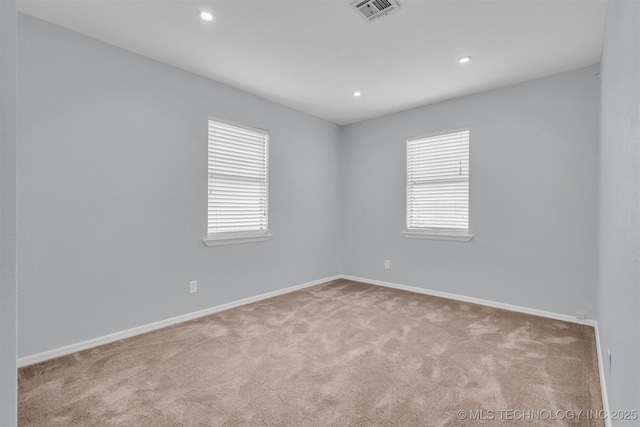 view of carpeted spare room