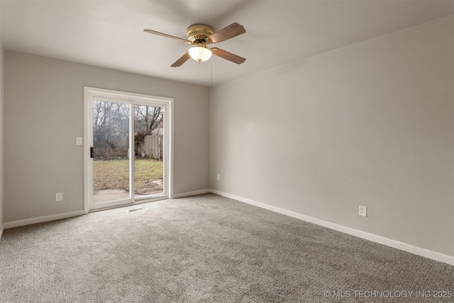 empty room with carpet flooring and ceiling fan