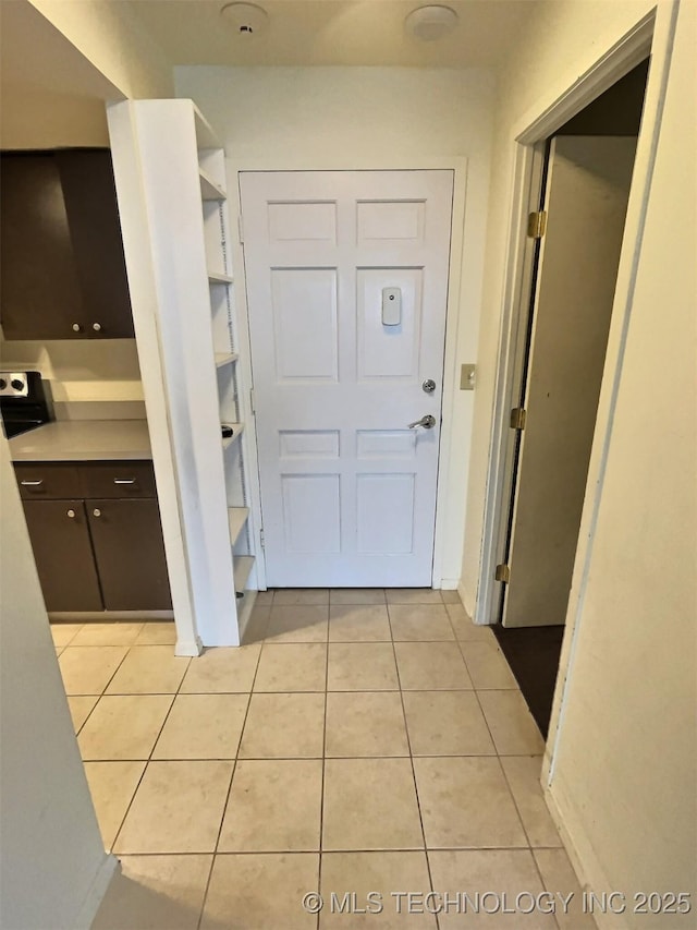 interior space featuring light tile patterned floors