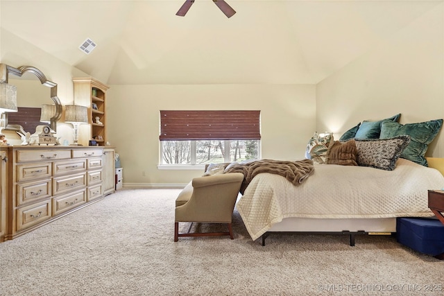 carpeted bedroom with ceiling fan and lofted ceiling