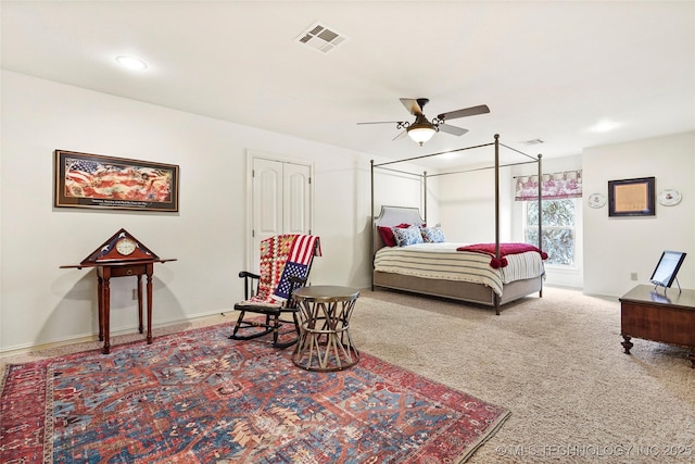 carpeted bedroom with ceiling fan