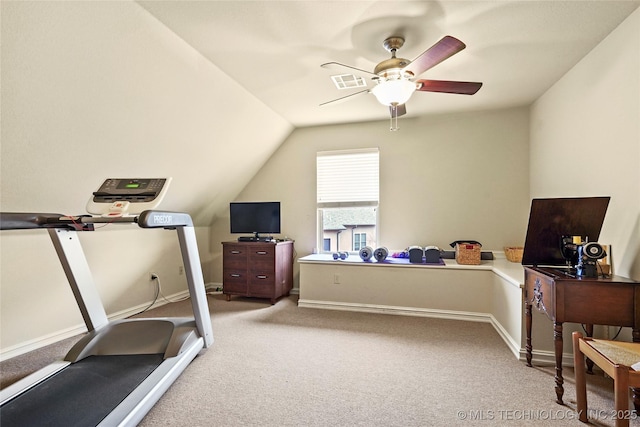 workout area with vaulted ceiling, ceiling fan, and carpet