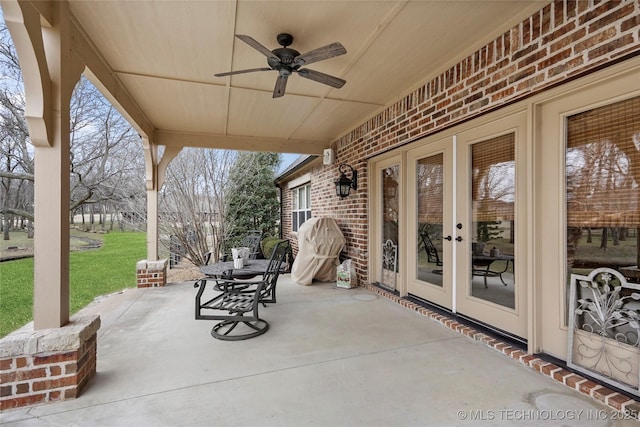 view of patio with ceiling fan and french doors