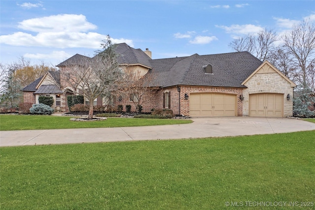 french provincial home with a garage and a front lawn