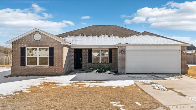 single story home with a garage