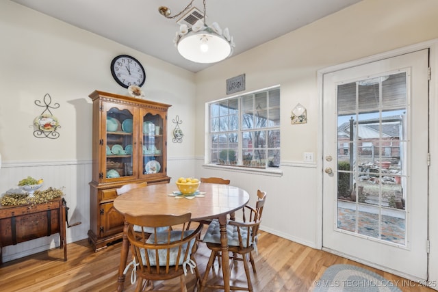 dining area with light wood-type flooring