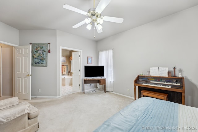 carpeted bedroom with connected bathroom and ceiling fan