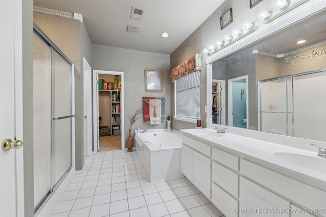 bathroom featuring vanity, separate shower and tub, and tile patterned flooring