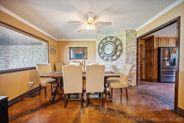 dining area with ceiling fan, crown molding, and a textured ceiling