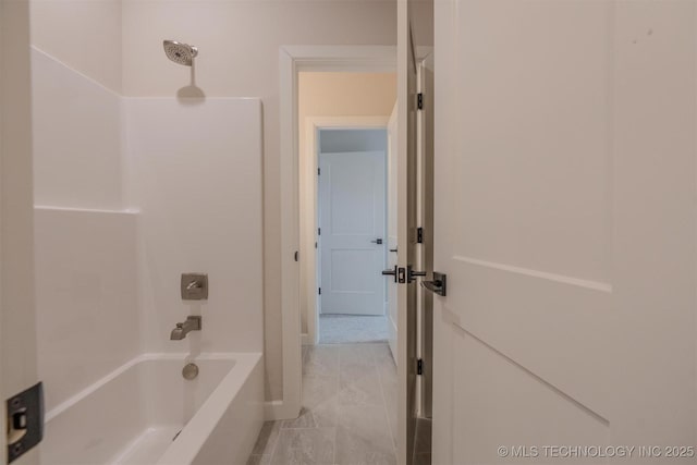 bathroom featuring washtub / shower combination