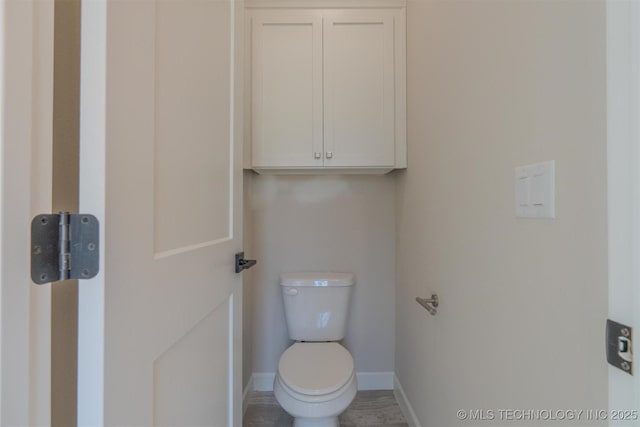 bathroom featuring toilet