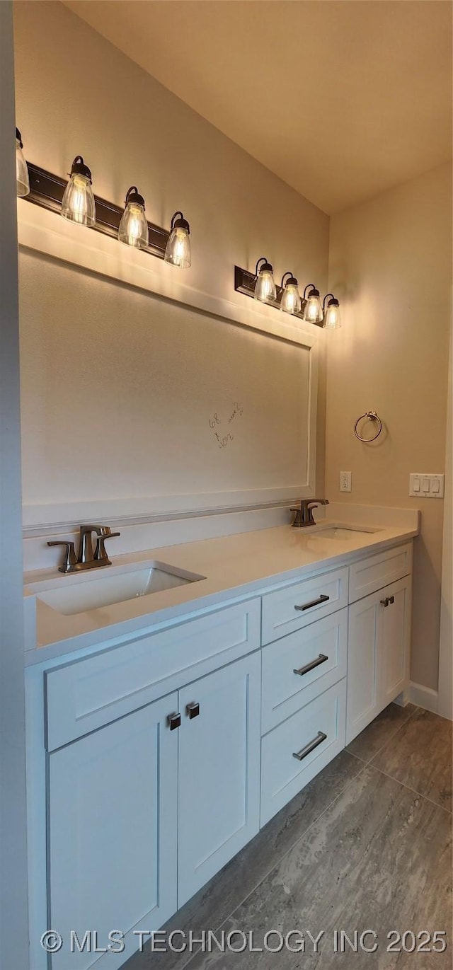 bathroom with double vanity and a sink