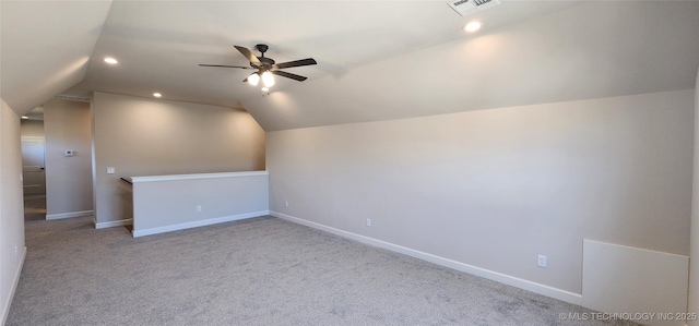 bonus room featuring visible vents, a ceiling fan, baseboards, carpet flooring, and lofted ceiling