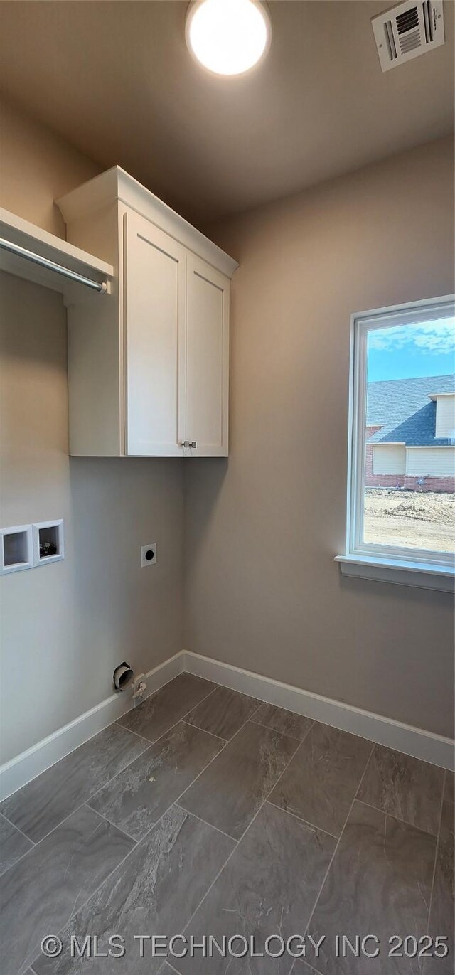 laundry room featuring baseboards, washer hookup, dark marble finish flooring, and hookup for a gas dryer