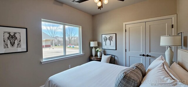 bedroom with a closet and a ceiling fan