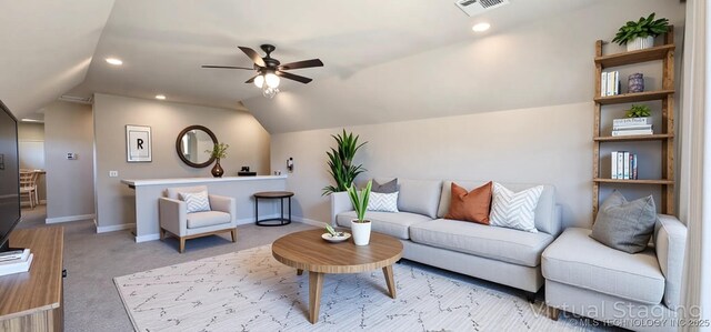 carpeted living room featuring vaulted ceiling, a ceiling fan, baseboards, and recessed lighting