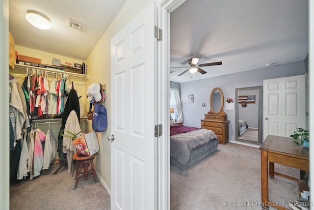 23260 Bessie Blvd, Claremore, OK 74019 - bedroom with carpet flooring, a closet, a ceiling fan, and baseboards