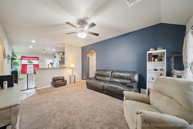 23260 Bessie Blvd, Claremore, OK 74019 - living area featuring arched walkways, a ceiling fan, carpet flooring, attic access, and baseboards