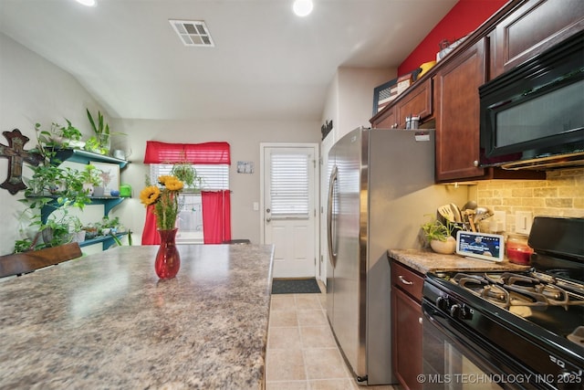 23260 Bessie Blvd, Claremore, OK 74019 - kitchen featuring black appliances, tasteful backsplash, light tile patterned flooring, and recessed lighting