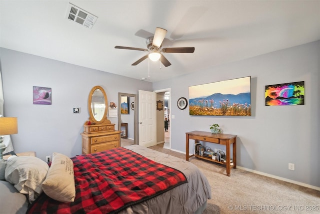 23260 Bessie Blvd, Claremore, OK 74019 - bedroom with light colored carpet, baseboards, and ceiling fan