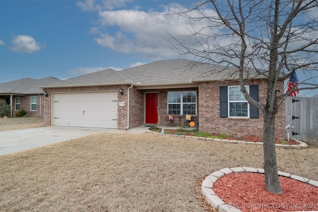 ranch-style house featuring a garage