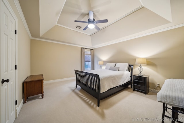 bedroom with crown molding, ceiling fan, a raised ceiling, and carpet floors