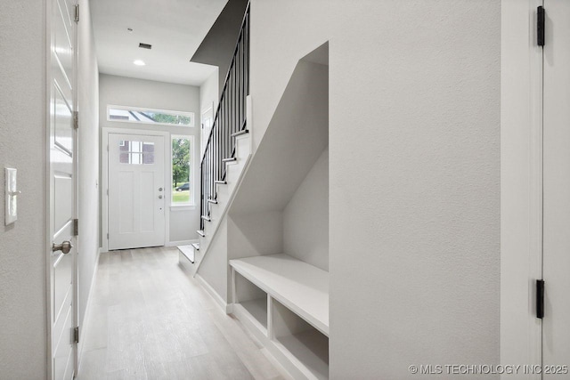 mudroom with light wood-type flooring