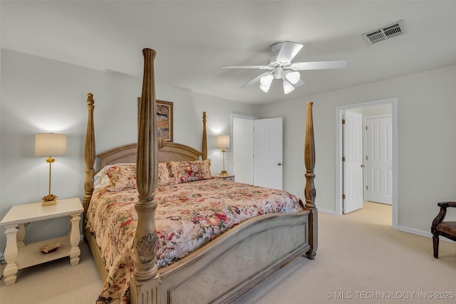 bedroom featuring light colored carpet and ceiling fan