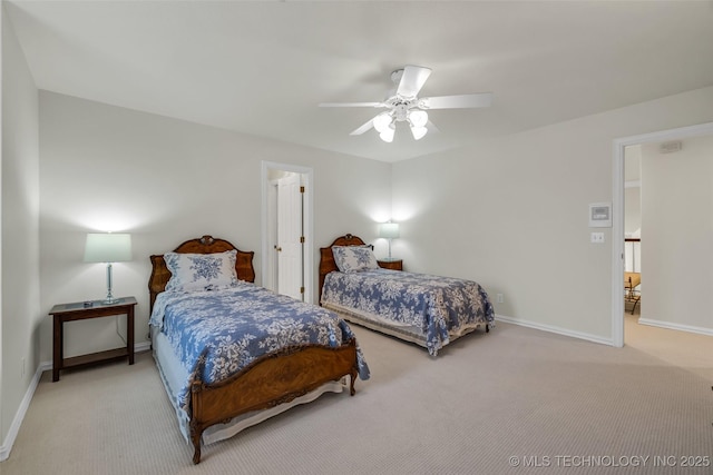 bedroom featuring light colored carpet and ceiling fan