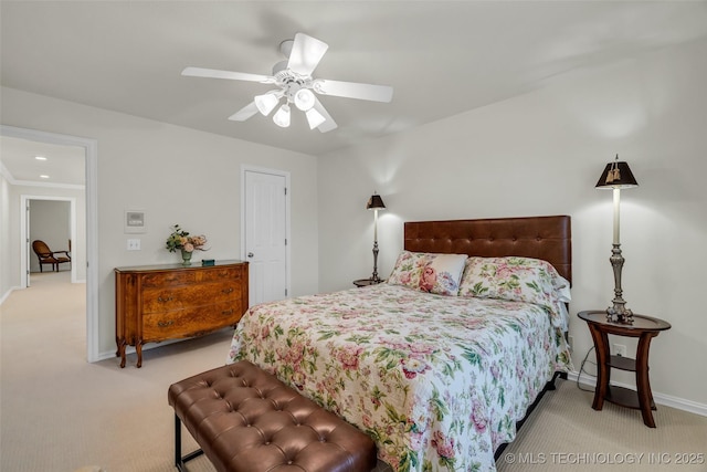 carpeted bedroom with ceiling fan