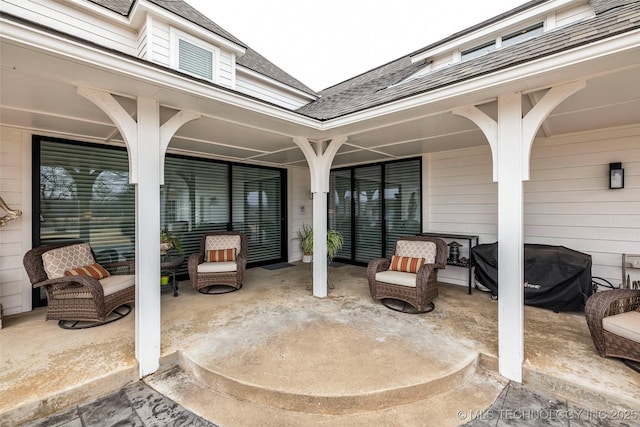 view of patio with a grill and an outdoor hangout area