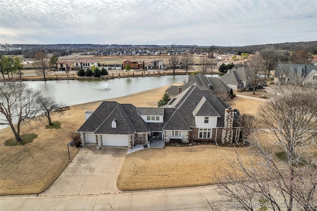 bird's eye view with a water view