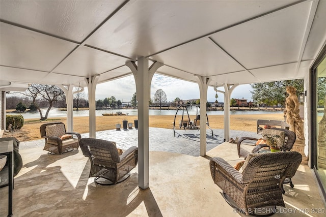 view of patio / terrace featuring a water view