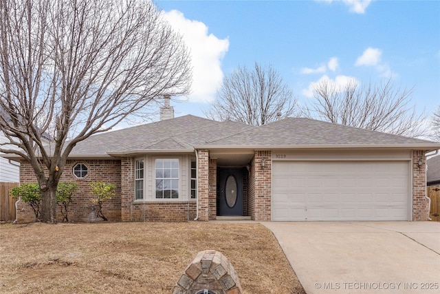 ranch-style home with a garage