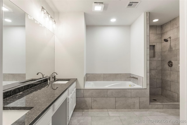 bathroom featuring vanity, separate shower and tub, and tile patterned flooring