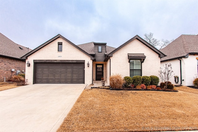 view of front of home with a garage