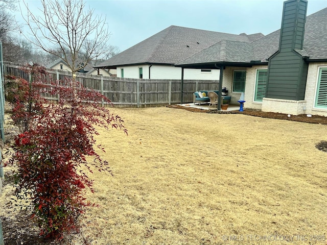 view of yard with a patio area