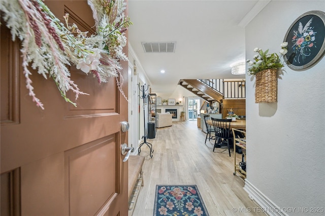 foyer entrance featuring light hardwood / wood-style flooring