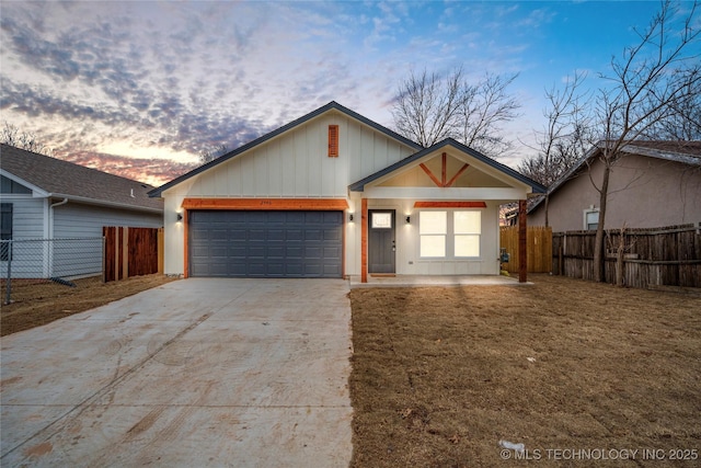 single story home featuring a garage