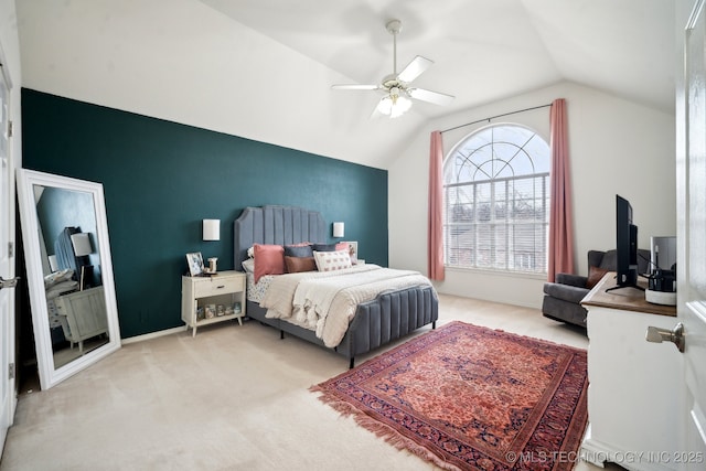 bedroom with ceiling fan, lofted ceiling, and light carpet