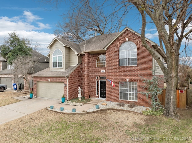 front of property with a garage and a front yard