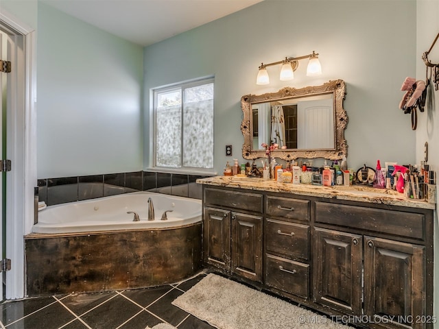 bathroom featuring tile patterned flooring, vanity, and a relaxing tiled tub