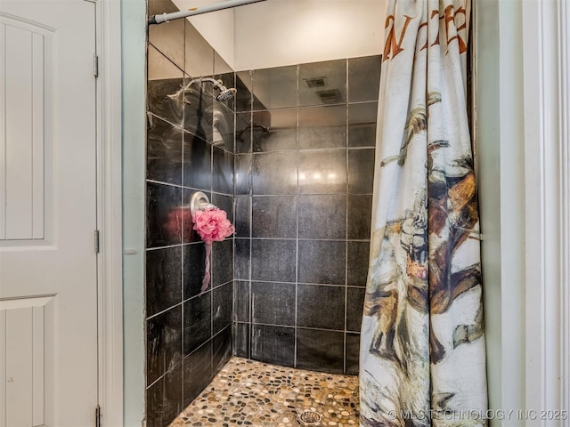 bathroom featuring curtained shower